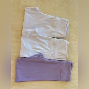 3 pairs of leggings size M, never used. Beautiful colors and quality